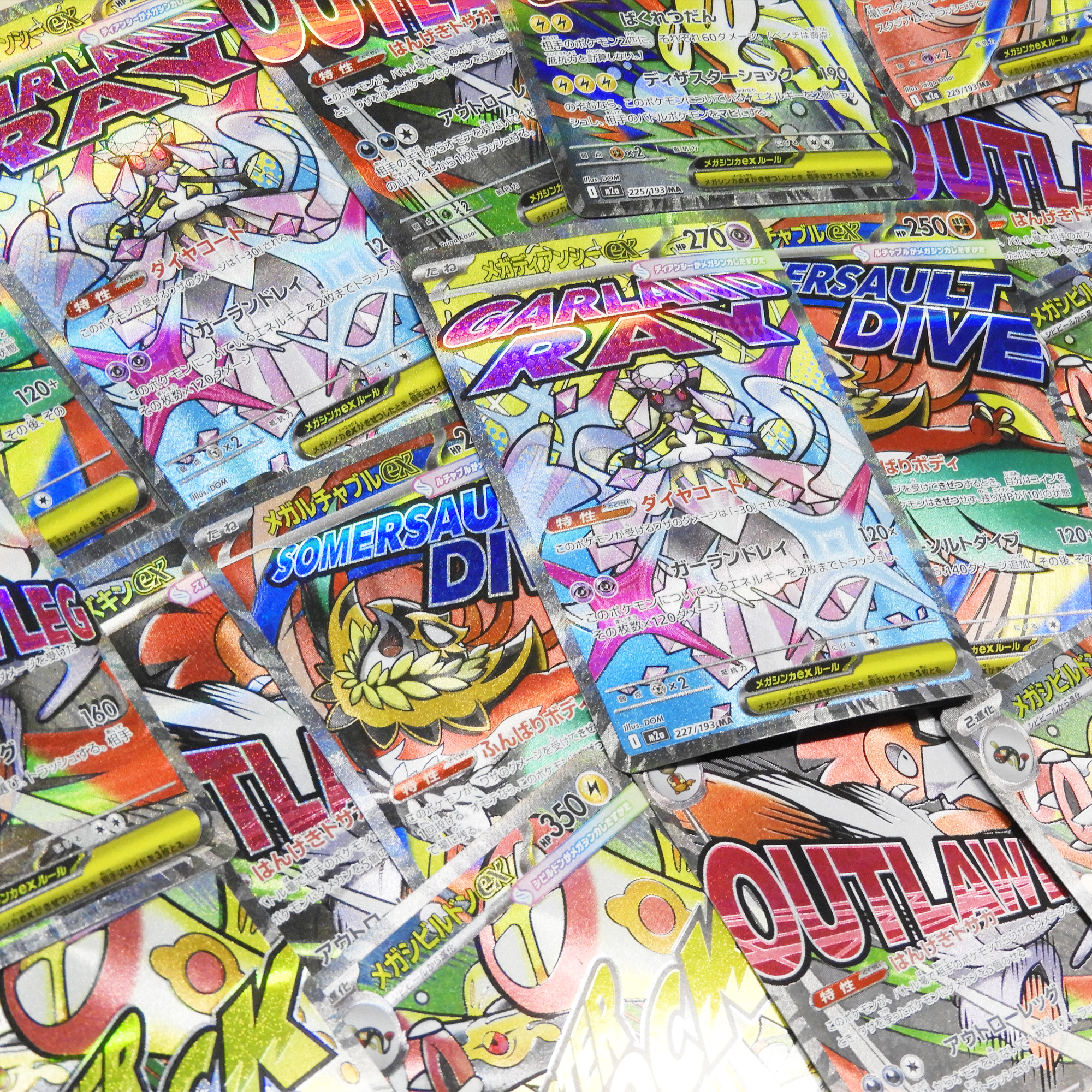 Japanese Pokémon cards spread across a surface for a real versus fake Pokémon card guide
